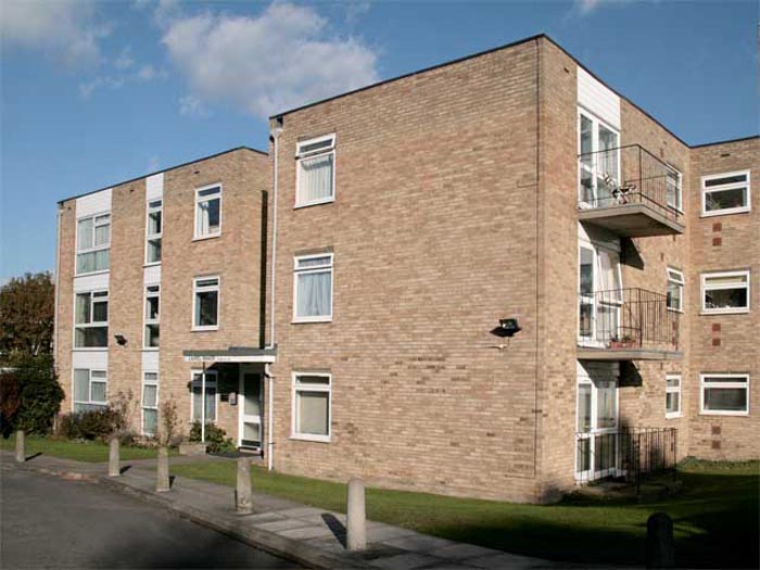 The sunlit front of Block C.